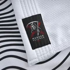 Skeleton label on the striped inner lining of the white gi