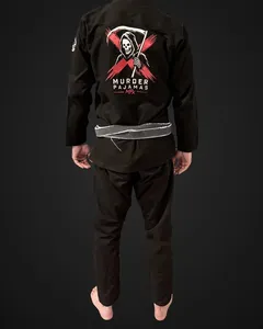 Back of Brent's black Murder Pajamas gi after 20 wash and dry cycles, showing the embroidered back art and MPx wordmark