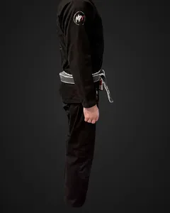 Side view of Brent's black Murder Pajamas gi after 20 wash and dry cycles, with the MPx shoulder patch