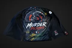 Brent's black Murder Pajamas gi jacket laid open after 20 wash and dry cycles, showing the printed lining