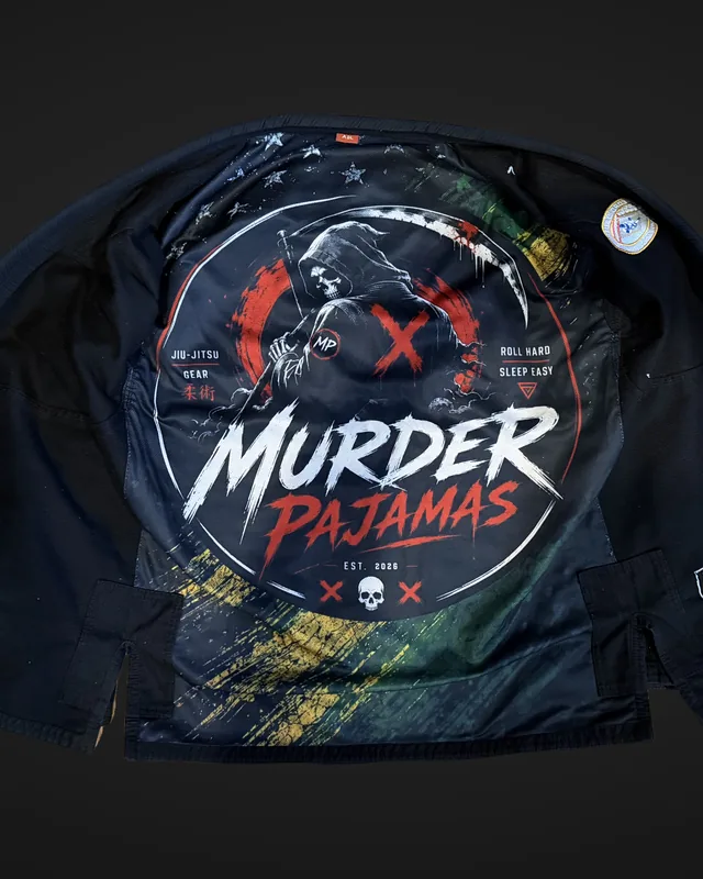 Inside of the black Murder Pajamas gi jacket laid open, showing the printed lining after 20 wash and dry cycles