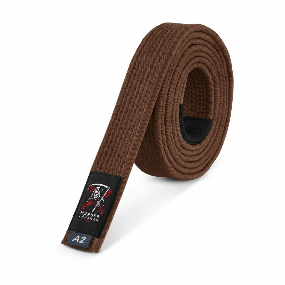 Brown Murder Pajamas jiu-jitsu belt, rolled, with the skeleton label and size tag