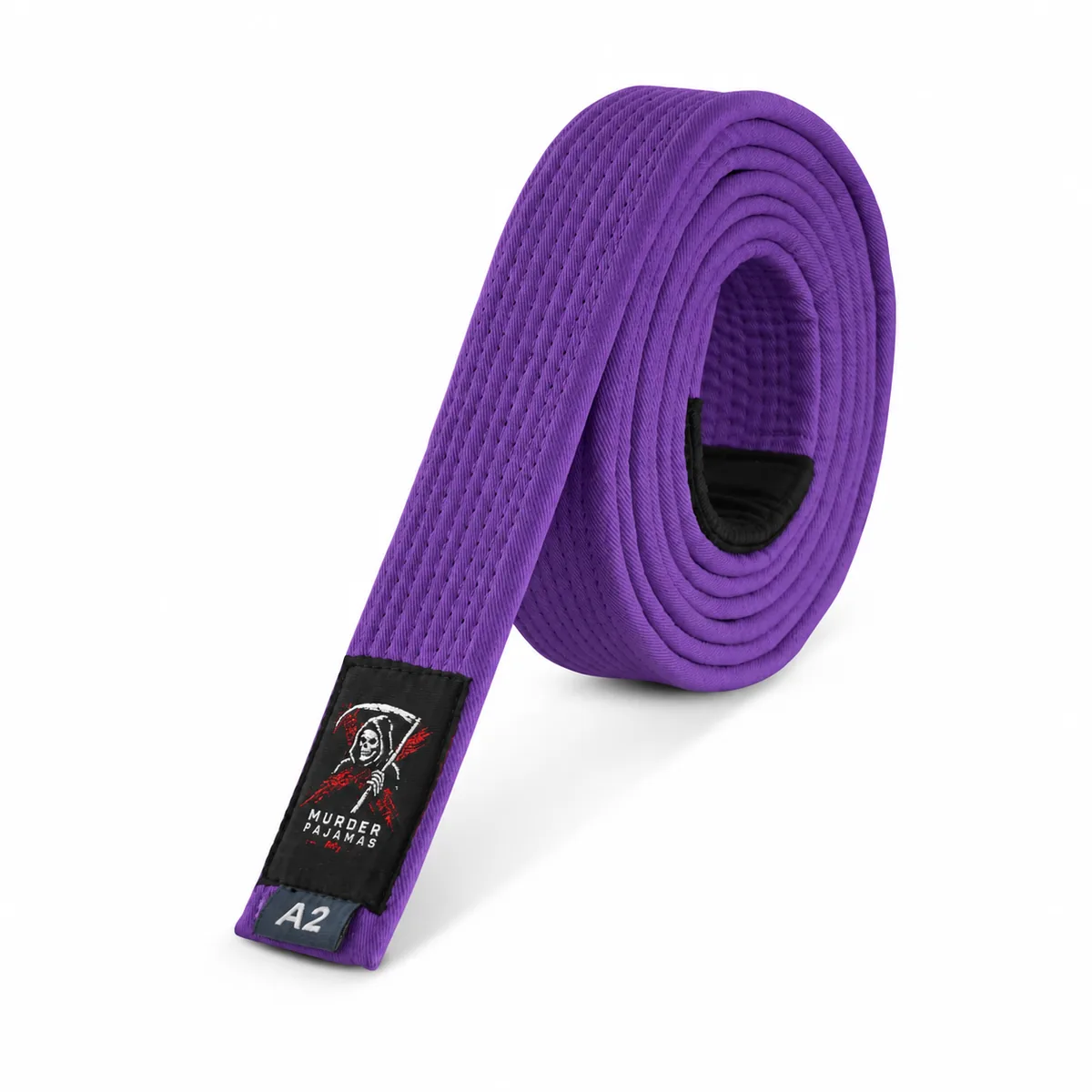 Purple Murder Pajamas jiu-jitsu belt, rolled, with the skeleton label and size tag